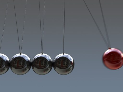 Péndulo de Newton con esferas metálicas en movimiento