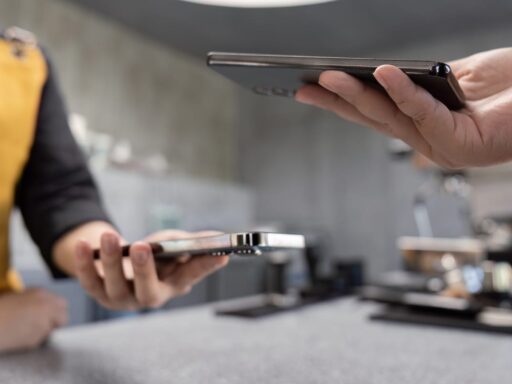 63291828 digital payment exchange with smartphones in cafe