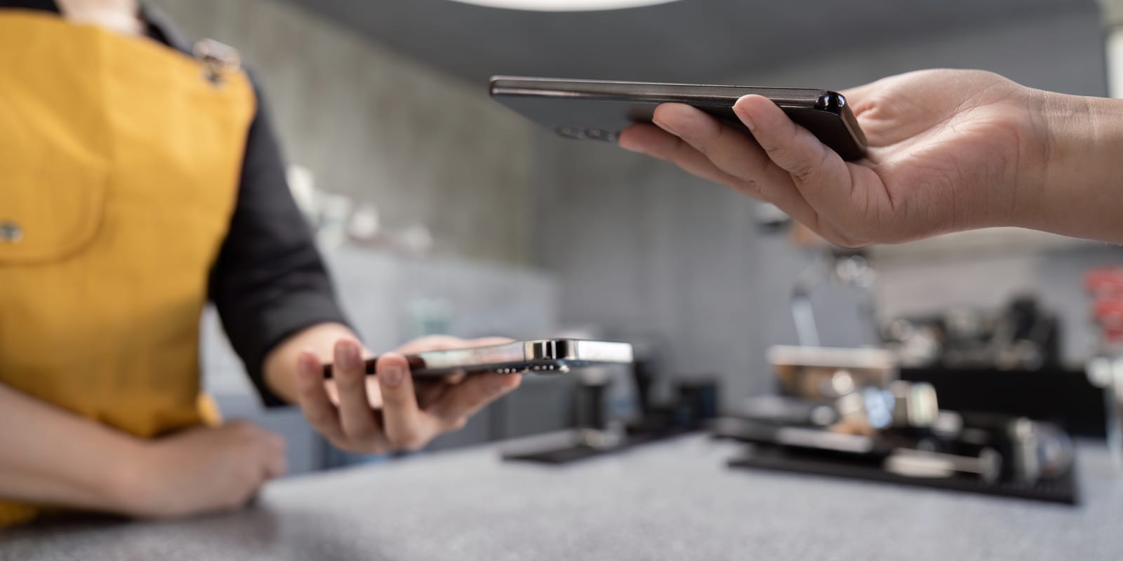 63291828 digital payment exchange with smartphones in cafe